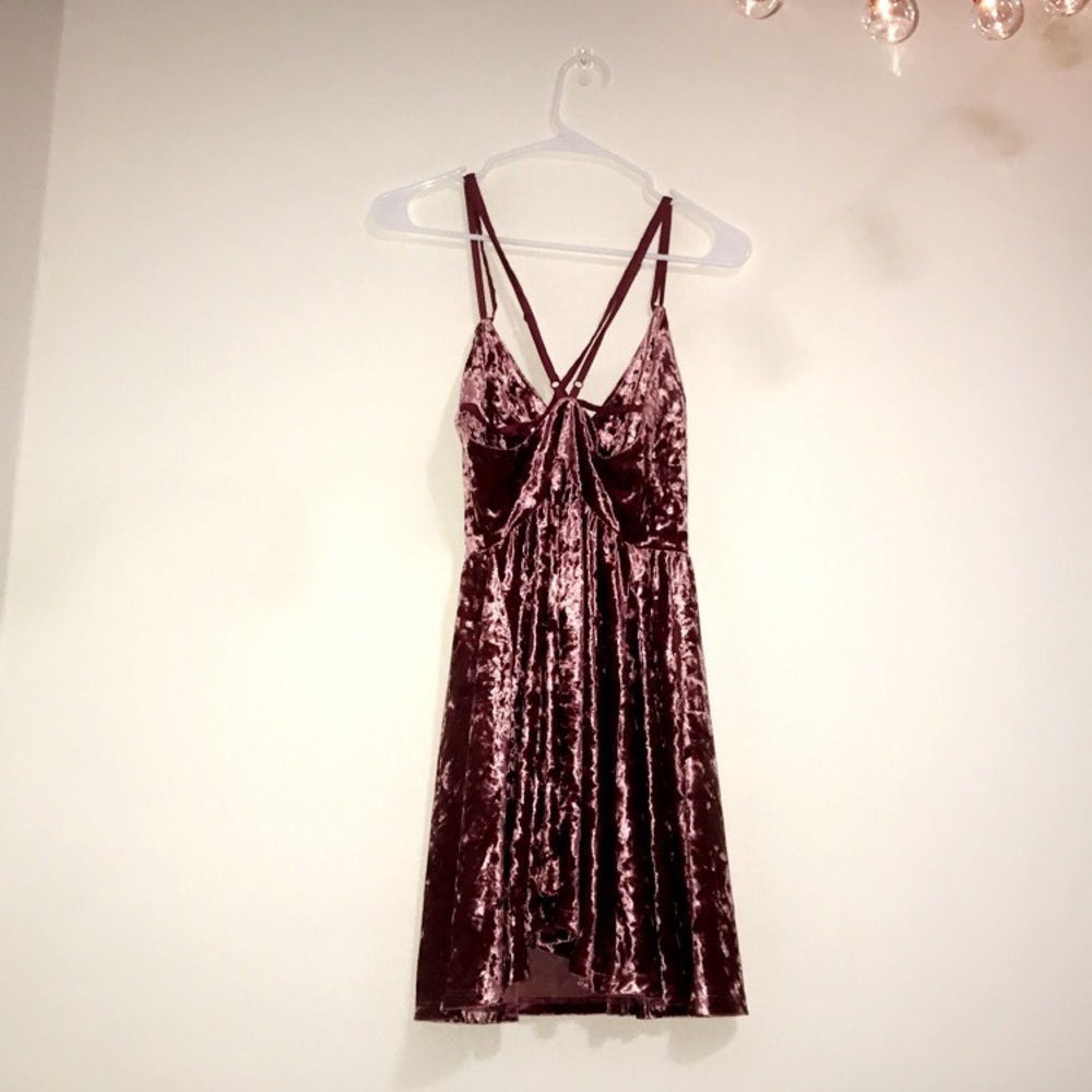 A velvet dress with criss cross straps